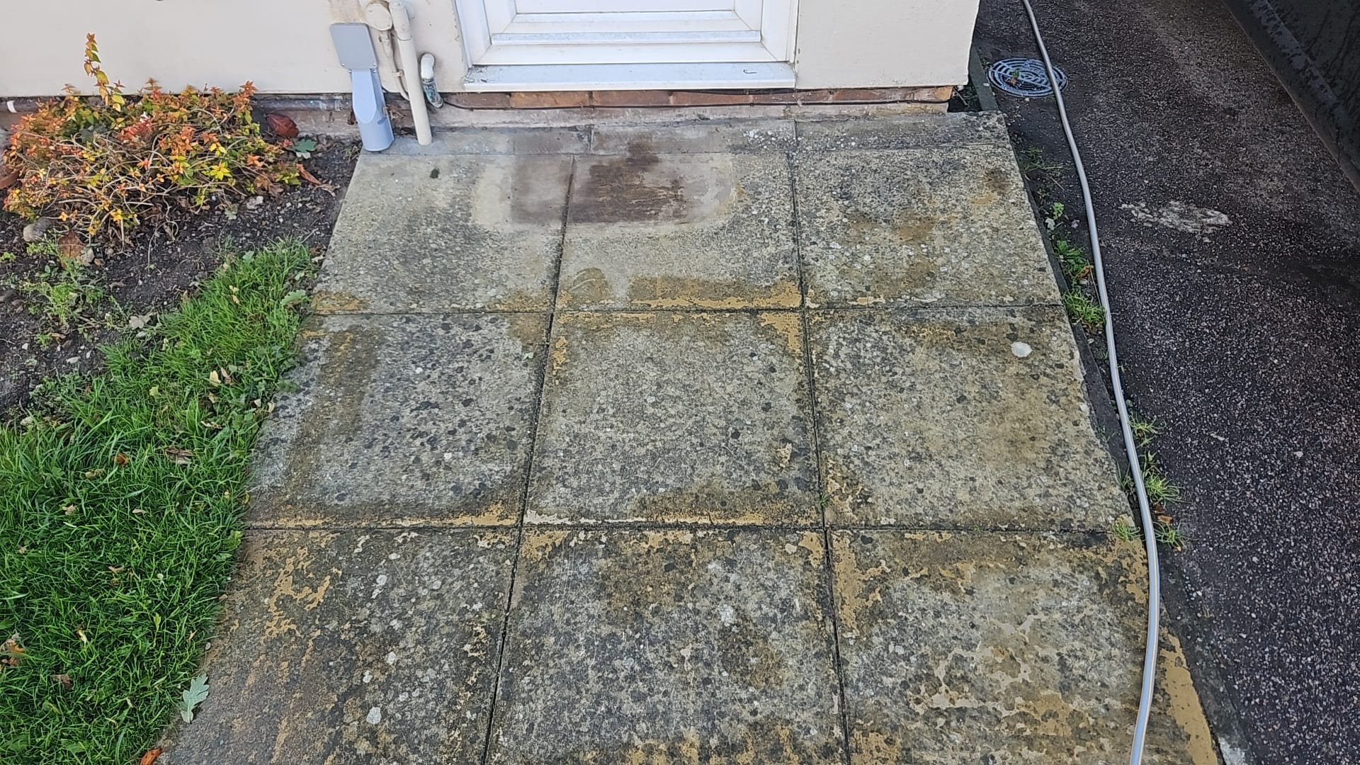 Patio before pressure washing — HydroSmiths North Walsham